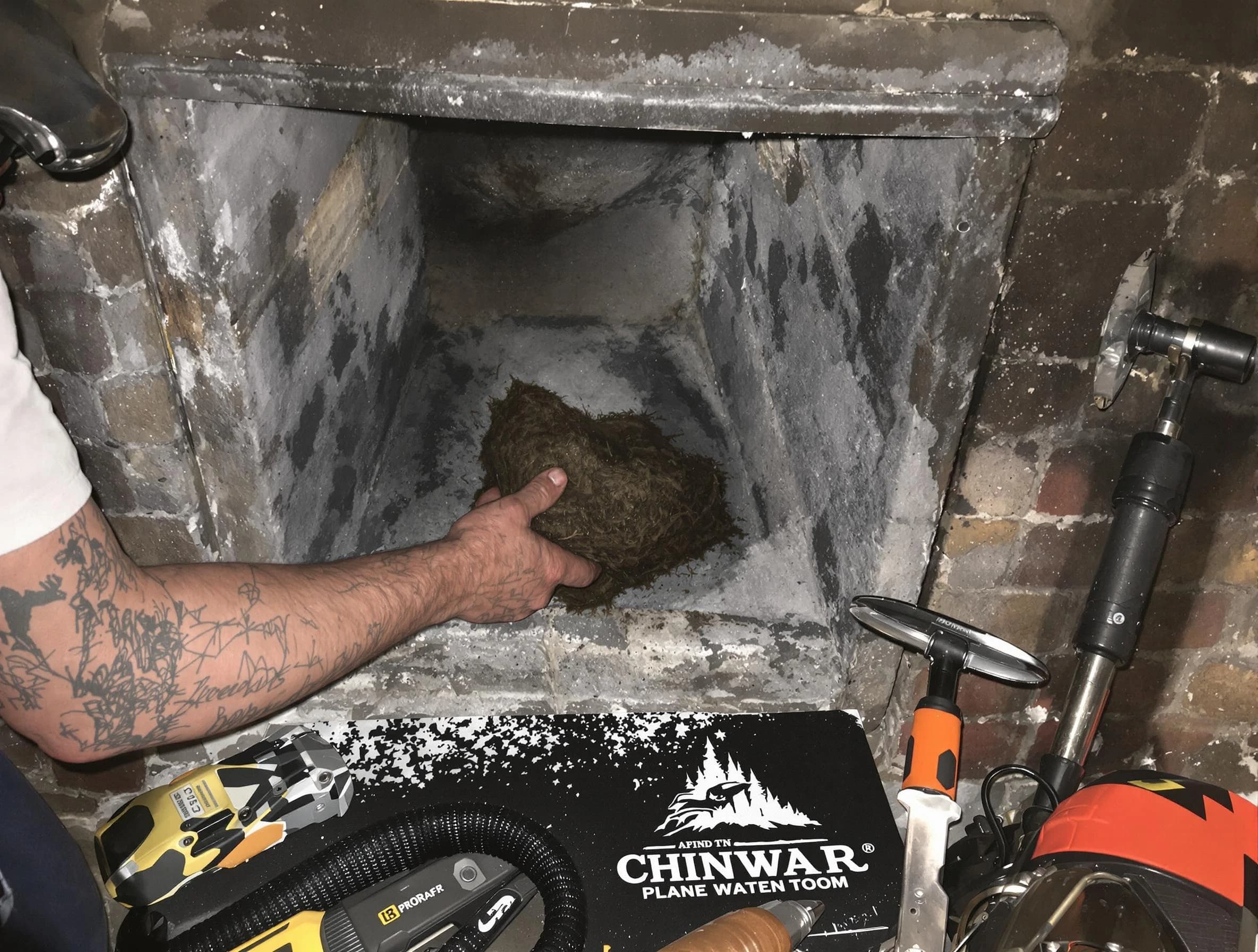 Egg Harbor Chimney Sweep safely removing debris and screening chimney in Egg Harbor, NJ